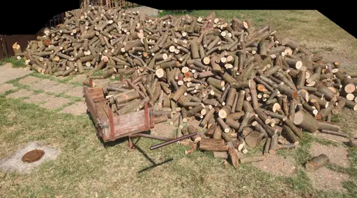 Photo 1: a large pile of firewood on a grassy area with a half-loaded handcart next to it. Photo 2: firewood stacked inside a shed.