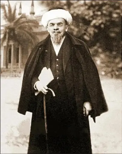 Lenin wearing traditional turban, with a long beard