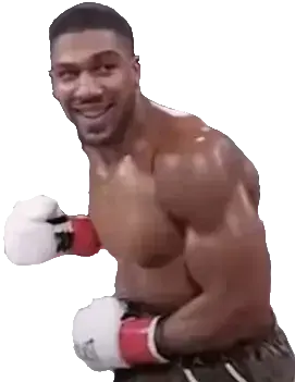 Anthony Joshua smiling as he prepares to break Jake Paul's jaw in two places. 