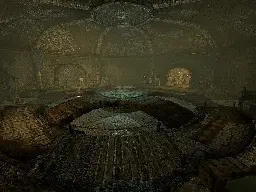 A large chamber within a sewer system, taken from the "Cistern" location in Skyrim.