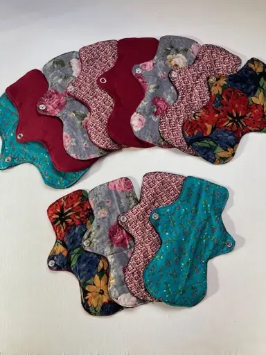 Twelve reusable menstrual pads