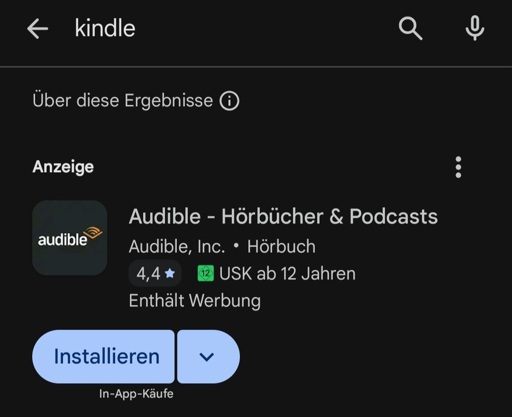 Suchergebnisse f&uuml;r die E-Book App "Kindle" im Android Play Store. Das oberste Werbe-Ergebnis ist die verwandte App "Audible" f&uuml;r Audio-B&uuml;cher.