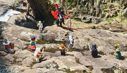 Zara Vexwood, Bethel "Bird Eye" Keats, Akki with Yir, Dhuathi Toe Cruncher, Verdeth Swiftrun with Kiba, and Quinras Nimblemoon take on Jaren Voss and his dragon Cholberis and two of his necromanced skeletons. 